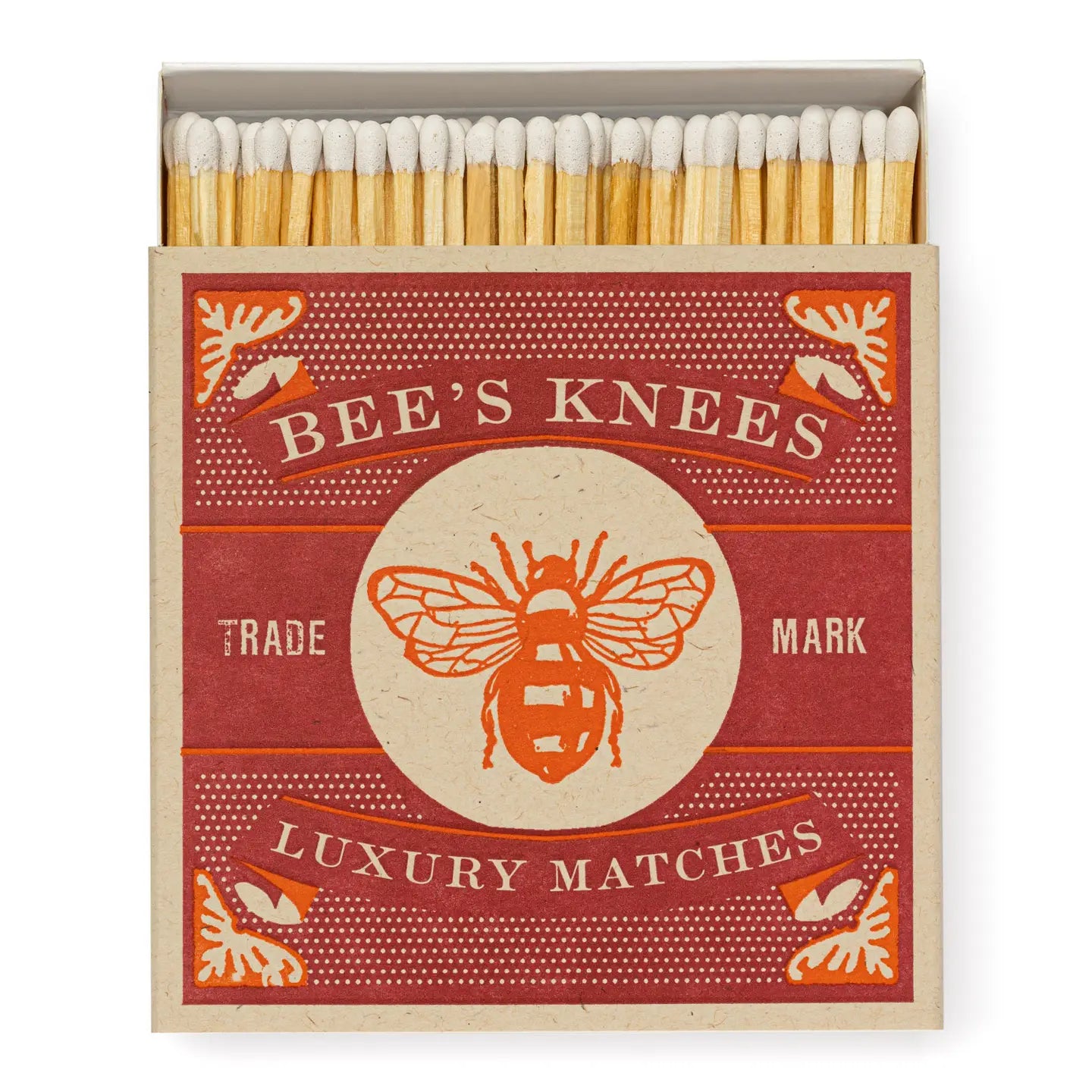Box of Bee's Knees luxury matches with a red and beige label.