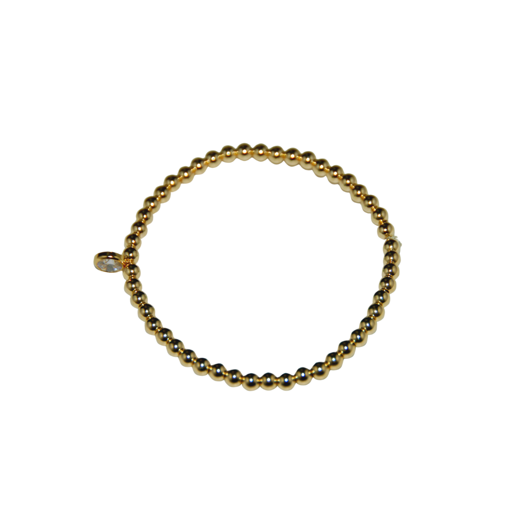 14k gold filled beads with a cz charm