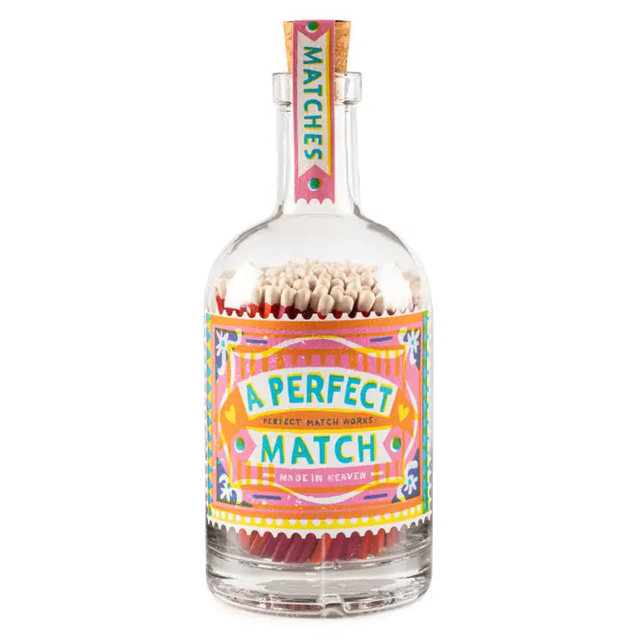 Bottle of matches with colorful label on a white background